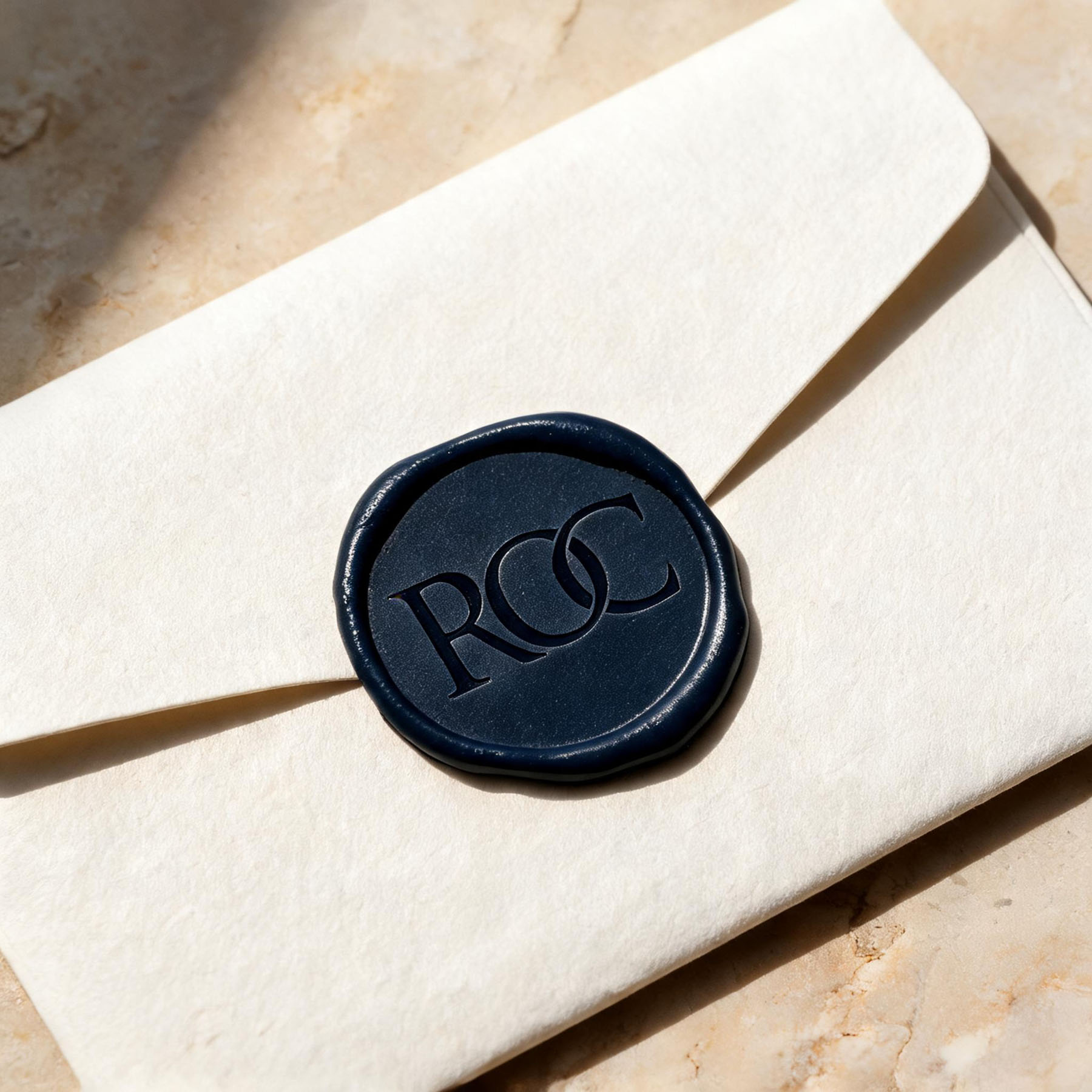 ROC Invest brand identity applied across stationery for a prime property specialist