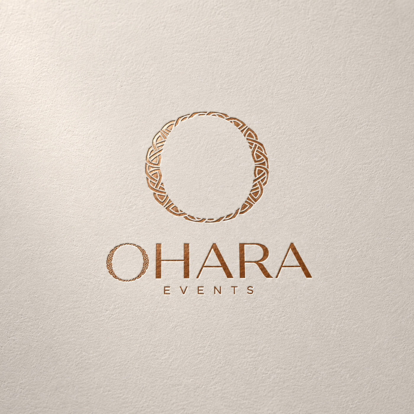 Luxury logo in copper foil on textured card