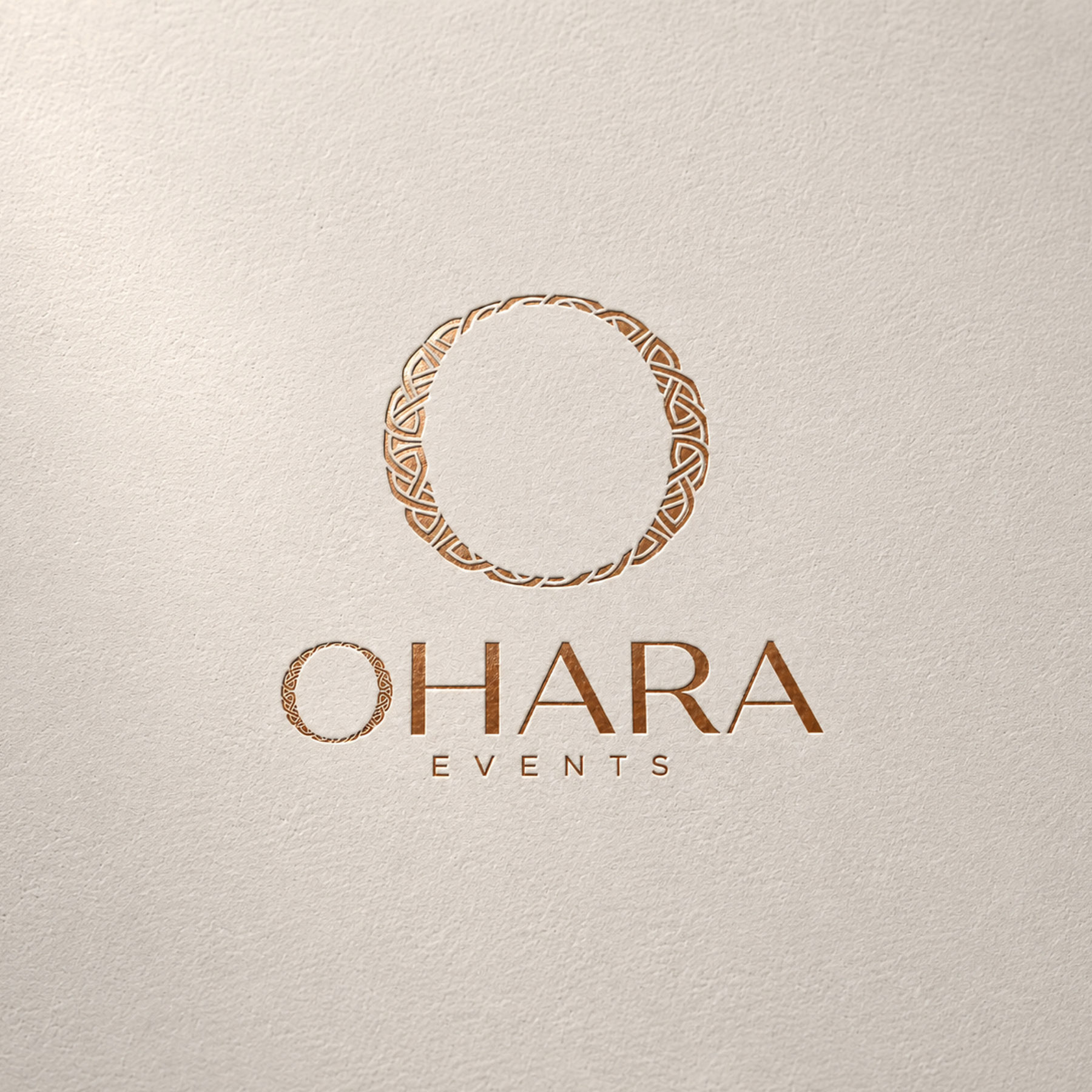 Luxury logo in copper foil on textured card