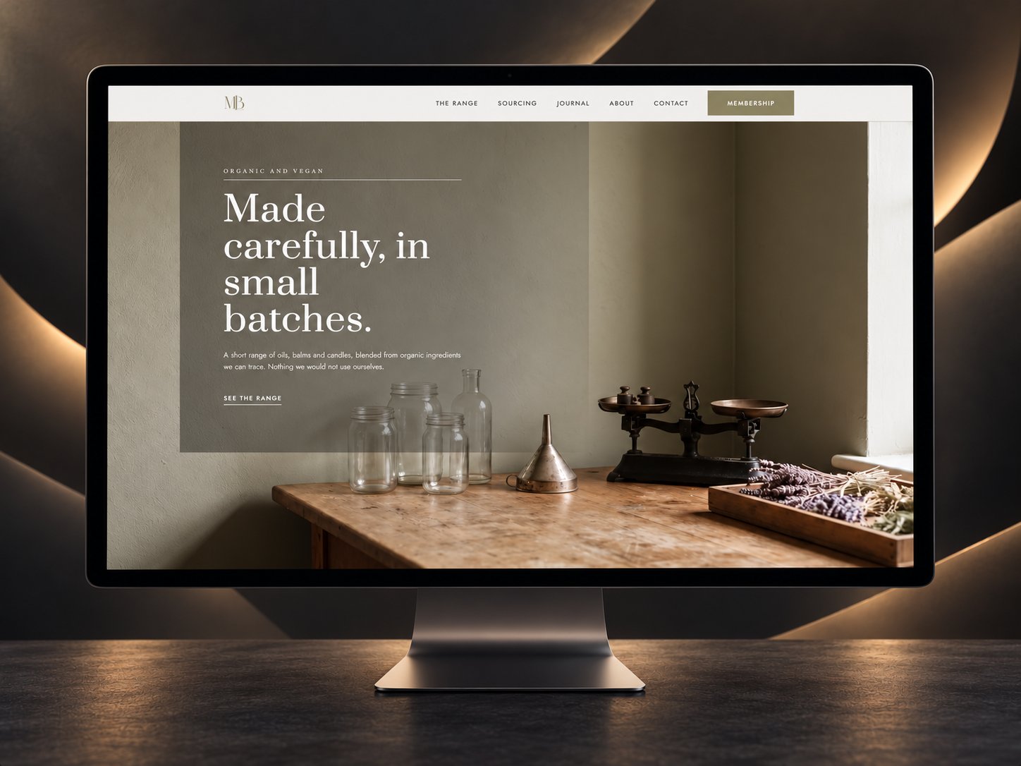 Mirabelle vibe coded HTML website design shown on a desktop monitor
